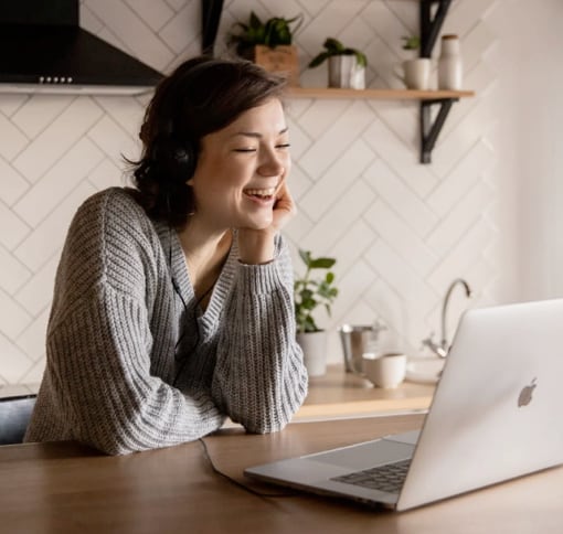 woman looking at laptop